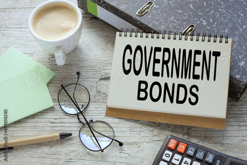 government bonds open notepad with text on document folder. Business concept. photo