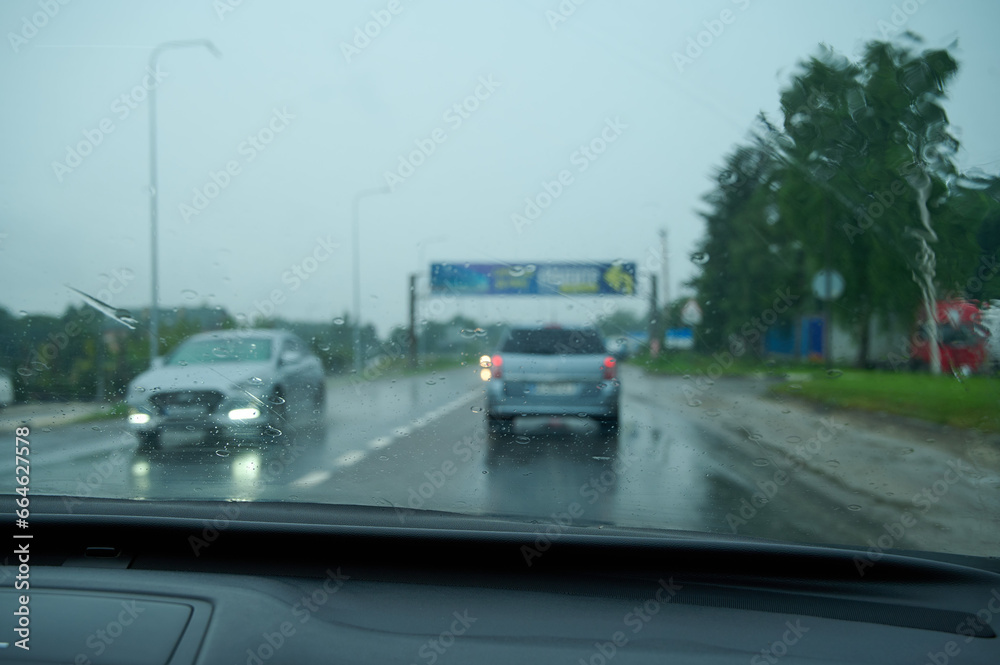 Fototapeta premium windshield of the car during rain