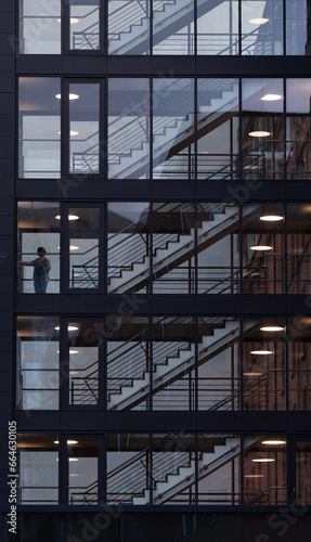 Modern corporate building exterior view with stairs and levels