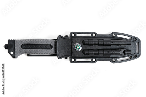 Tactical knife in sheath white background.