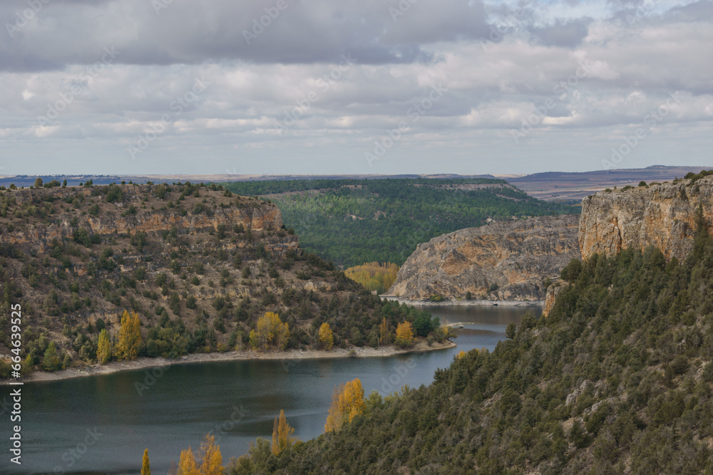 River Duraton with Burgomillodo reservoir during autumn time in Hoces del Duraton natural park near Sepulveda, Segovia, Spain