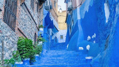 Chefchaouen town in Morocco, known as the Blue Pearl, famous for its striking blue color painted medina buildings and streets, creating a unique and magical atmosphere. © CanYalicn