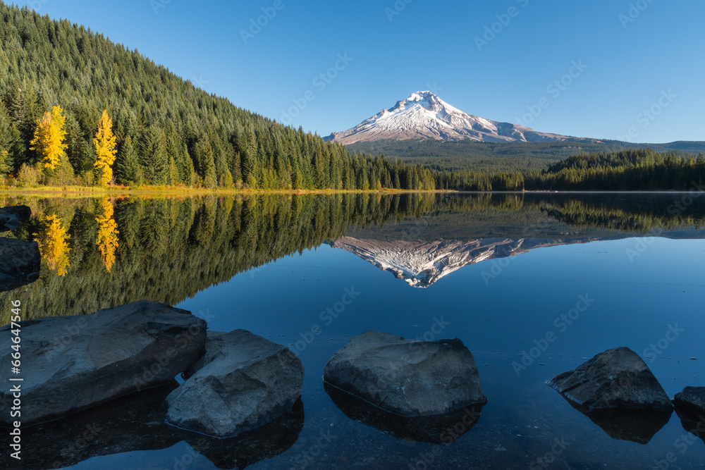 Morning reflections at lake in the mountains  - obrazy, fototapety, plakaty 