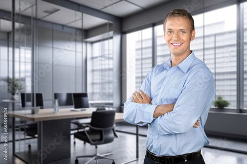 Happy confident business man in office hall, AI generated image