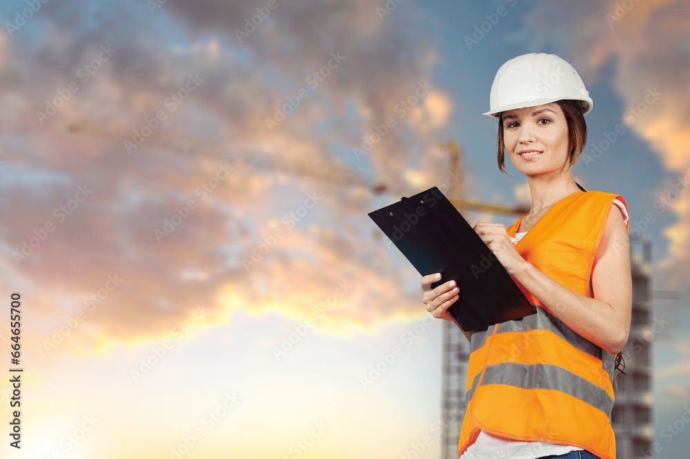 Portrait of smart worker engineer in large factory Portrait of smart worker engineer in large factory