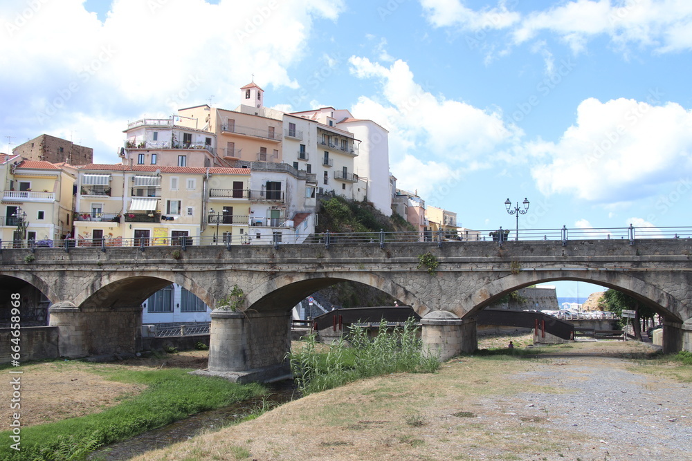 
view of the town of Diamante, Cosenza, Calabria, Italy with famous bridge over the river that flows into the sea