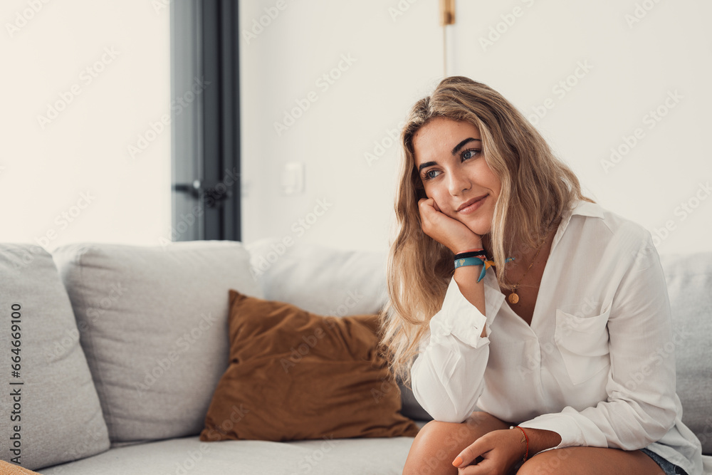 Happy young woman look in distance feeling positive and optimistic, dream or visualizing of new beginning, smiling millennial girl thinking overjoyed excited for future, happiness, good mood concept. Happy young woman look in distance feeling positive and optimistic, dream or visualizing of new beginning, smiling millennial girl thinking overjoyed excited for future, happiness, good mood concept.