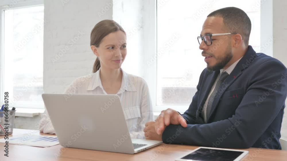 Positive Mixed Race Business People Talking about Online Work Positive Mixed Race Business People Talking about Online Work