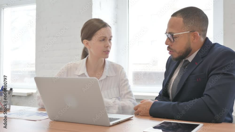 Angry Mixed Race Business People having Argument at work Angry Mixed Race Business People having Argument at work