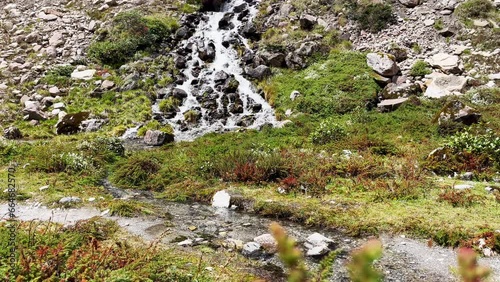 Mountain creek running down in Makalu Barun National Park near Kothe settlement. Mera peak climbing route, Himalayas, Nepal. photo