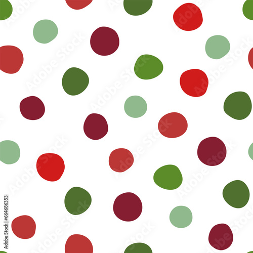All over seamless repeat pattern with hand drawn irregular polka dot on white in shades of red, green, mint, maroon. Traditional trendy modern xmas background with tossed dots
