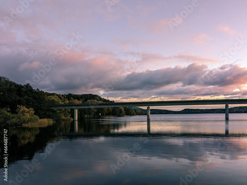 Scenic view of lake against sky during sunset