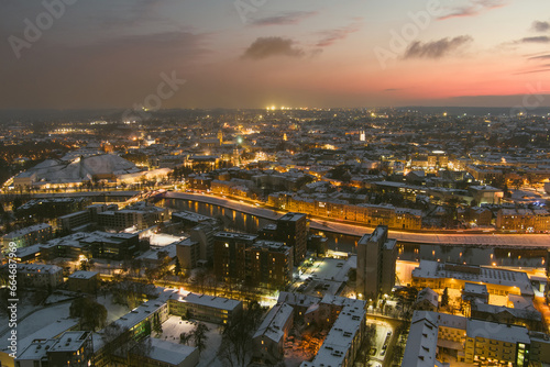 Wallpaper Mural Beautiful aerial evening view of illuminated business district in Vilnius. Winter sunset in capital of Lithuania. Torontodigital.ca