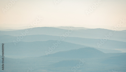 Hazy layers of Mountains in Distance in Lassen Volcanic © kellyvandellen