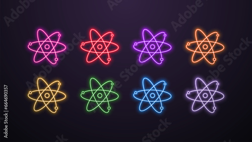 A set of neon atom icons in different colors on a dark background. A concept for science.