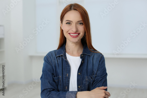 Portrait of beautiful young woman at home