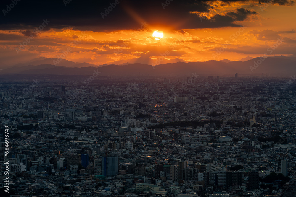 Tokyo city view with sun at sunset time.