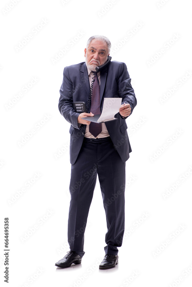 Old businessman talking by phone isolated on white Old businessman talking by phone isolated on white