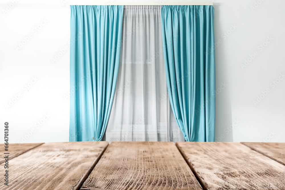 Empty wooden table against window indoors. Space for design Empty wooden table against window indoors. Space for design
