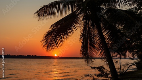 Sunset over the tranquil island UHD wallpaper Stock Photographic Image