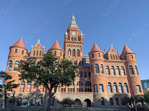 A large brick Gothic style building in the city of Dallas Texas. Pointy architecture in America.