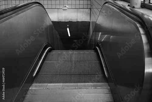 Automatic escalator in the subway. Mechanical escalator in the international airport or modern subway train station