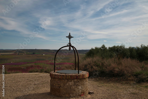 Traditional stone well out of service, in aitona Lerida, Spain photo