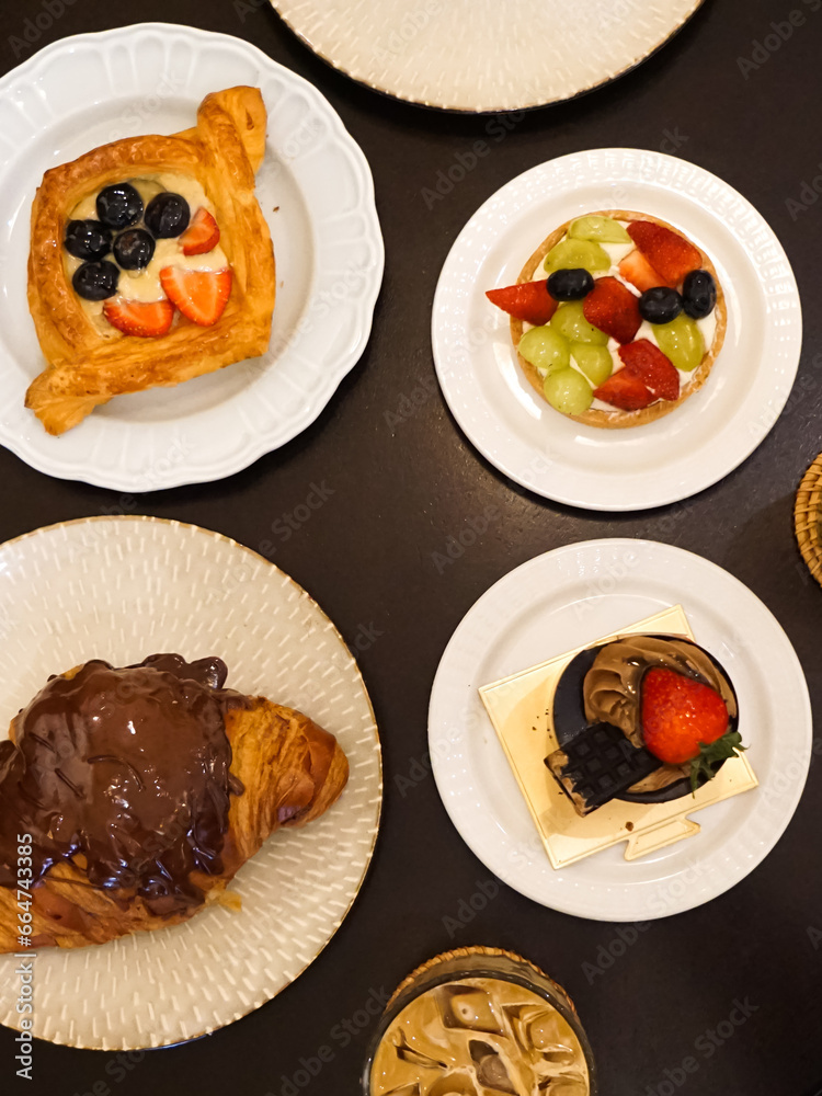 Cake, pastries and drinks on the table. Close up. Cake, pastries and drinks on the table. Close up.