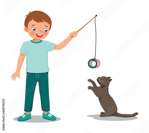 Cute little boy pet lover playing with his cat