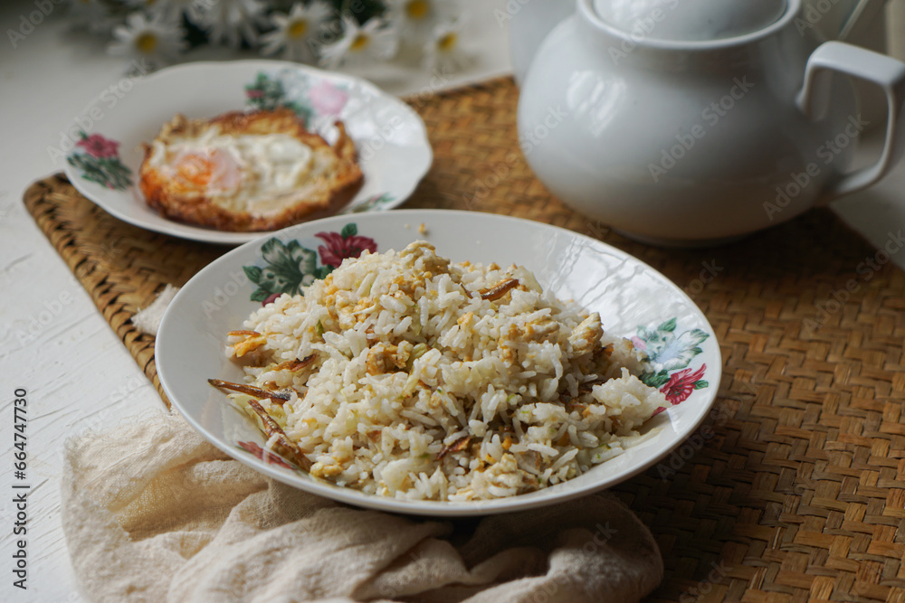 Fried rice (nasi goreng kampung) and fried egg Fried rice (nasi goreng kampung) and fried egg