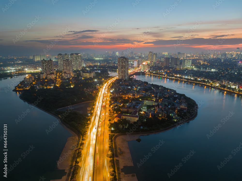 Naklejka premium Hanoi skyline cityscape at sunset in Linh Dam, Hoang Mai district