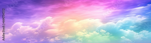 Rainbow sky with fluffy clouds. Multicolored toned sky.