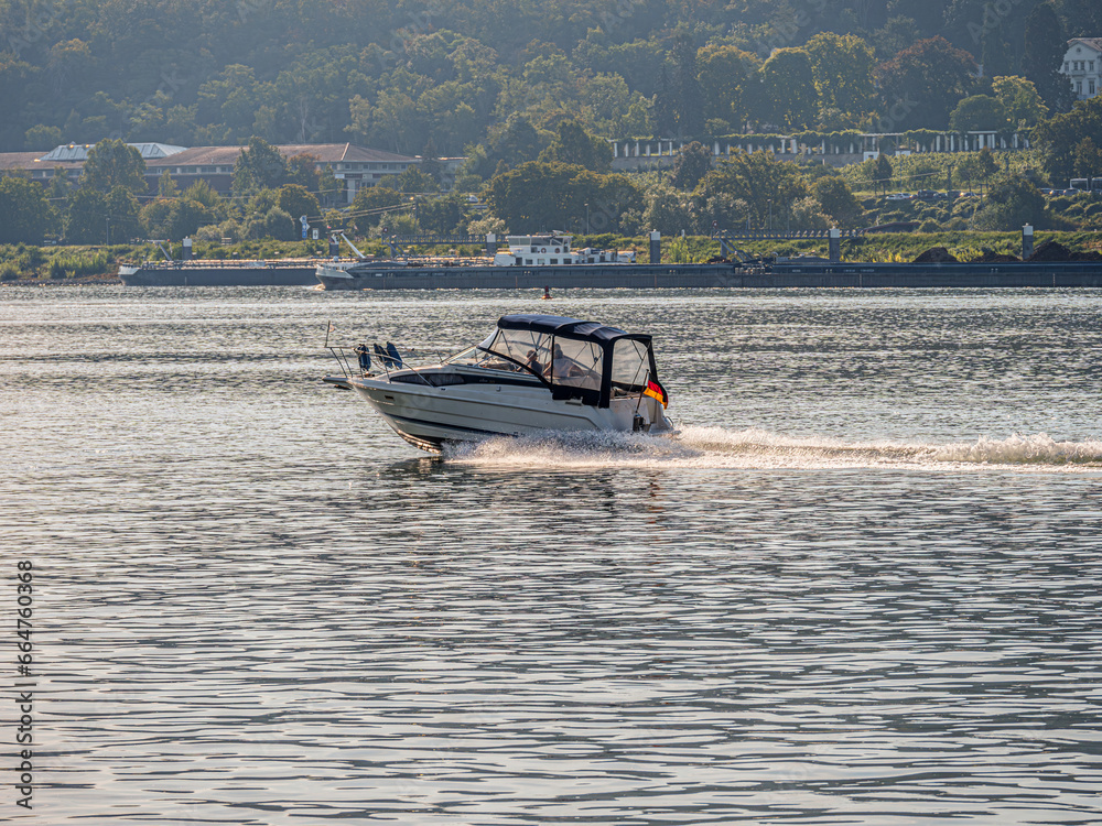 Fototapeta premium Speeding Past Barges