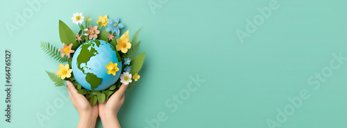 Hand Holding Eco Friendly Earth Banner with Copyspace, Papercraft Style, Save the World Background, Earth day, Environment Day #664765127