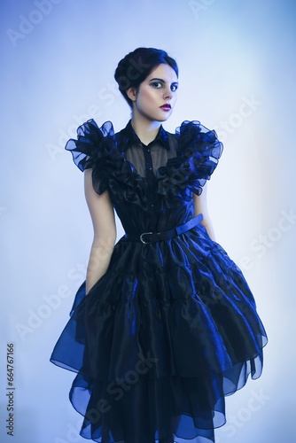 Cosplay girl in Wednesday Adams black dress