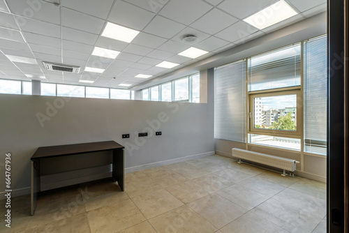 Interior of a modern office with huge panoramic windows, after renovation