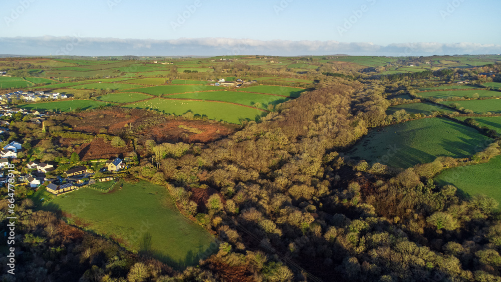 View of woods and fields stretching to the horizon. Cornwall, UK View of woods and fields stretching to the horizon. Cornwall, UK