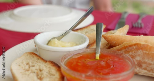 Close up shot of typical appetizer, pan con tomate served on a table in Spain. photo