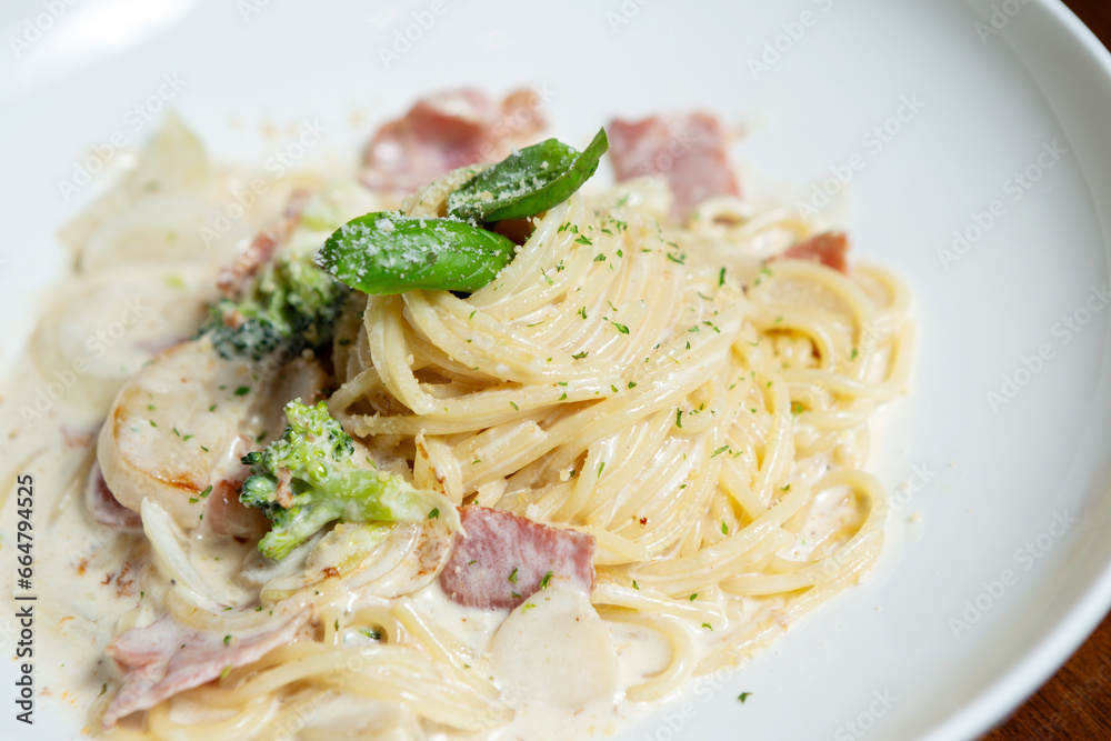 Bacon cream sauce pasta on a plate Bacon cream sauce pasta on a plate