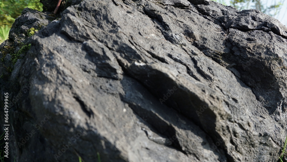 climber on a rock texture stone climber on a rock texture stone
