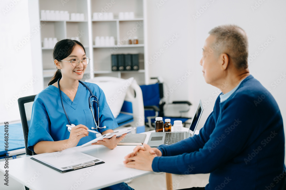 Serious Asia female doctor using clipboard is delivering great news talk discuss results or symptoms with female patient in clinic or hospital . Serious Asia female doctor using clipboard is delivering great news talk discuss results or symptoms with female patient in clinic or hospital .
