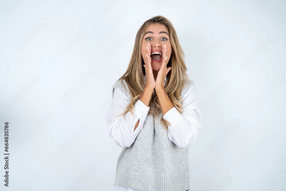Young beautiful woman shouting excited to front. Young beautiful woman shouting excited to front.