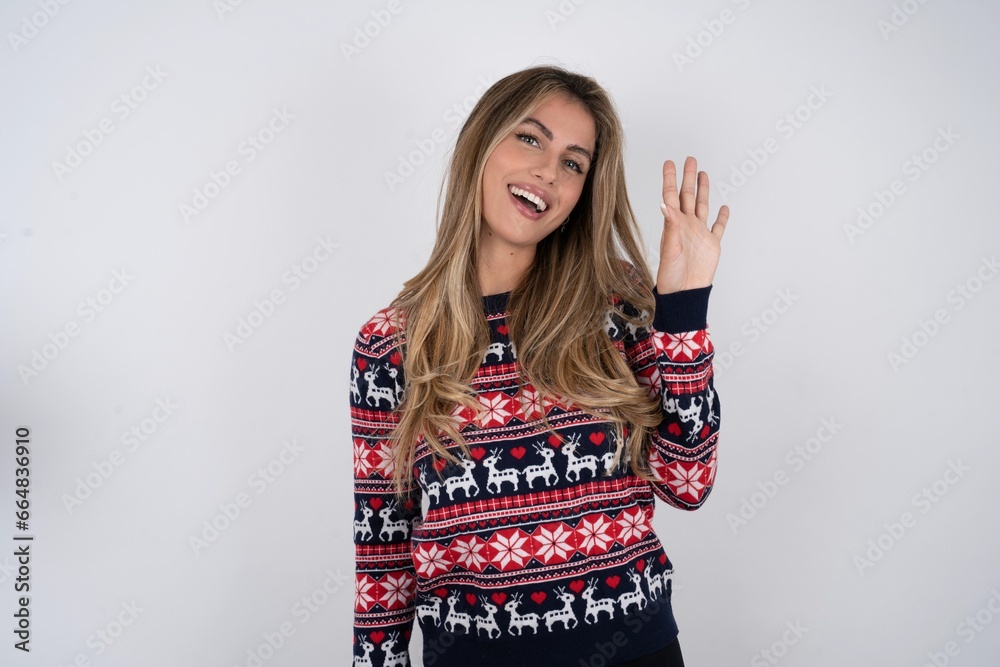 Overjoyed successful Young beautiful woman raises palm and closes eyes in joy being entertained by friends Overjoyed successful Young beautiful woman raises palm and closes eyes in joy being entertained by friends