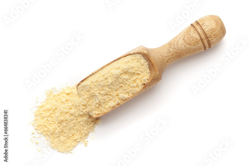 Organic Corn Flour (Zea mays) or Makka Flour in a wooden scoop, isolated on a white background. Top view.