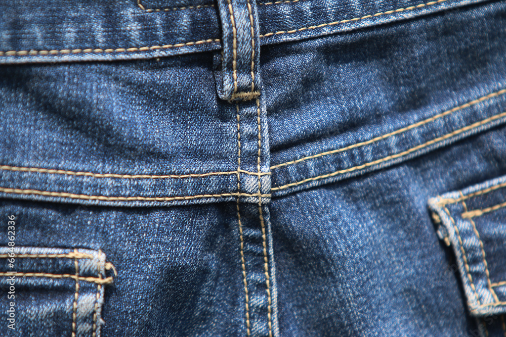 Jeans denim texture close up , focus only one point , soft blured background wallpaper Jeans denim texture close up , focus only one point , soft blured background wallpaper