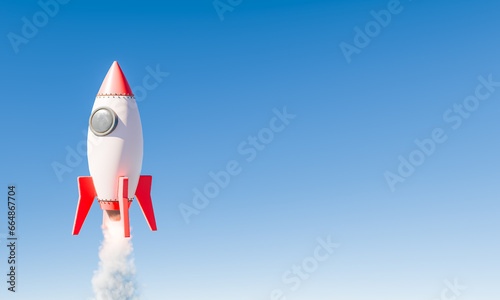 Fototapeta Naklejka Na Ścianę i Meble -  Rocket flying high in the blue sky