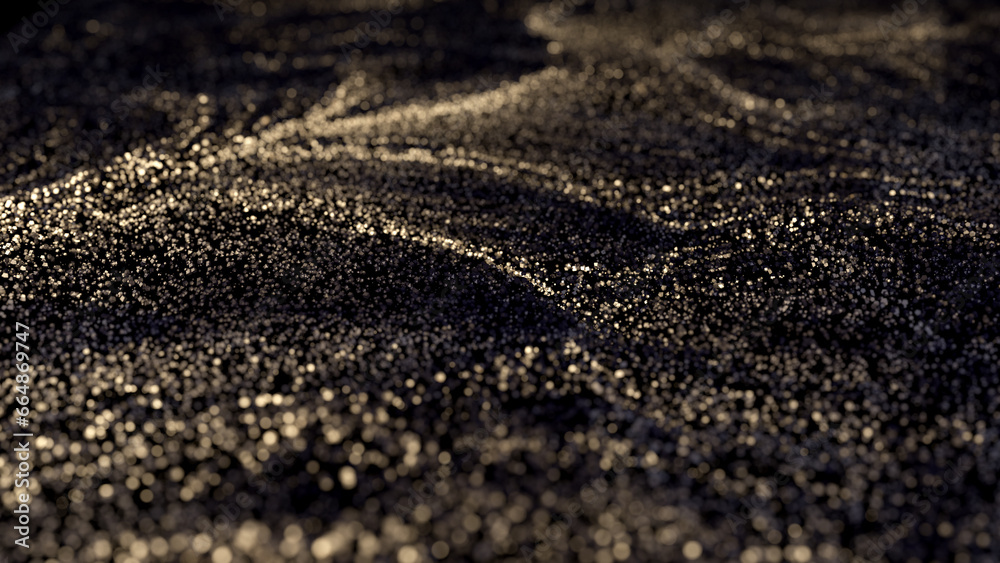 Black glitter with gold flecks. Golden loosened sand on ground.