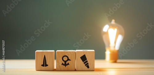 Creative idea, solution and innovation concept. Idea generation for business development. Wooden cube blocks with light bulb and cycle icons on clean background and copy space. photo