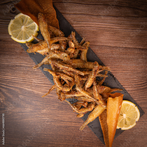 DEEP FRIED SEEFOOD, RECIPE FOR FISH, Smelt AND FRIED PITA, LEMON. High quality photo photo