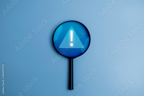 Photo mix of magnifying glass graphic and glowing notification icon, cyber detection and prevention concept.